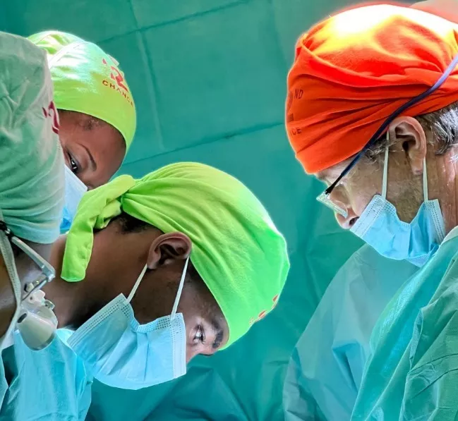 Surgeons performing reconstructive surgery during a 2nd Chance workshop in Sub-Saharan Africa.