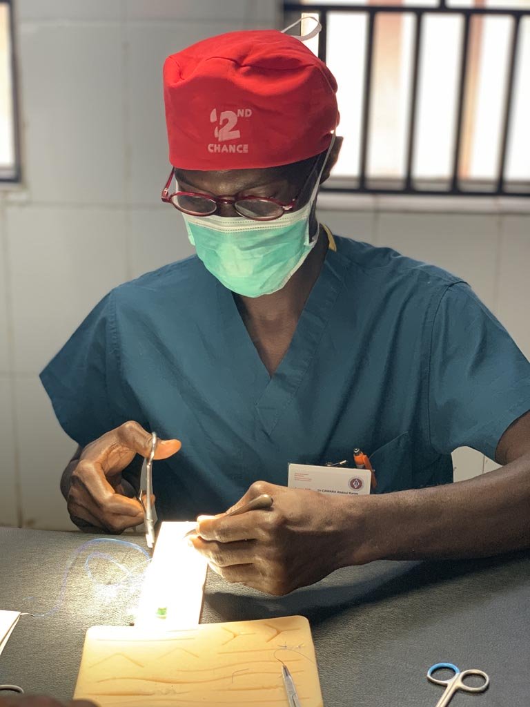 Surgeon performing reconstructive surgery during a 2nd Chance workshop in Sub-Saharan Africa.